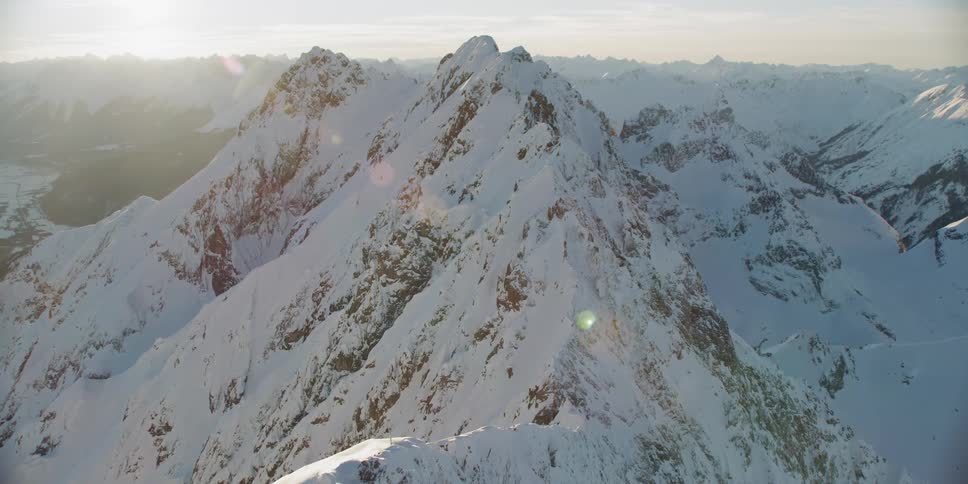 Snow covers the mountain landscape