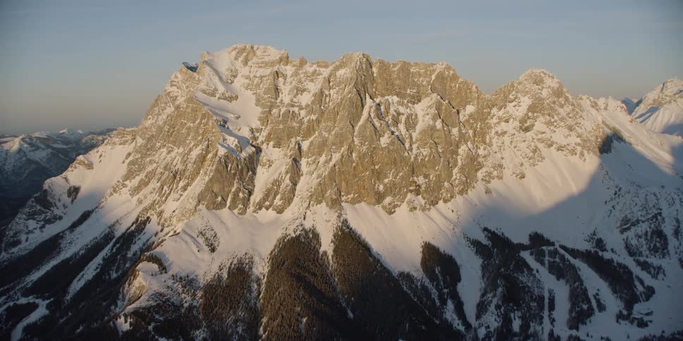 Snow covers the mountain landscape