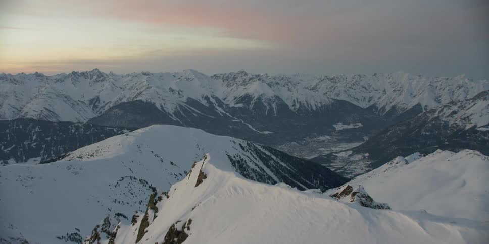 Snow covers the mountains