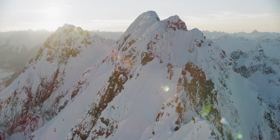 Snow covers the mountain landscape