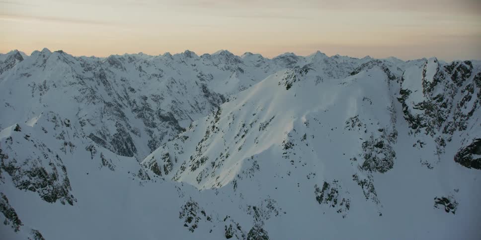 Snow covers the mountain landscape