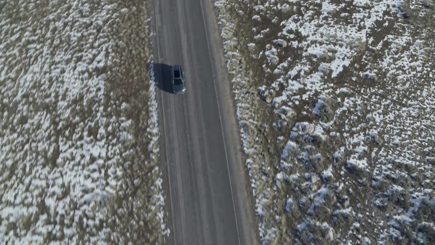 Car travels on a rural road