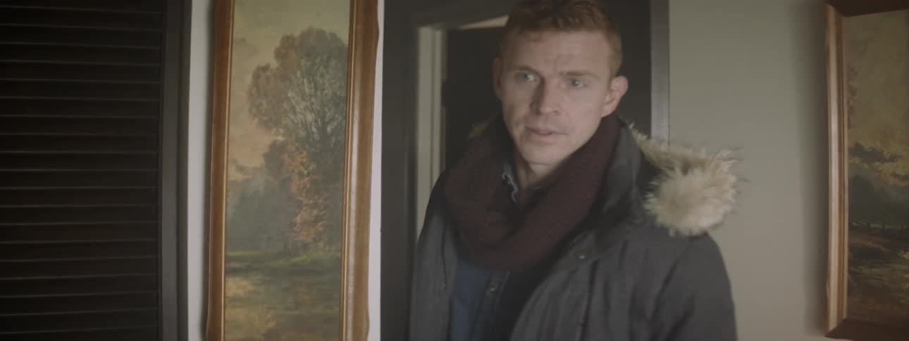 A man enters into a room