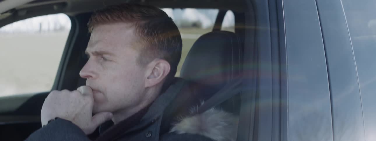 Man drives a vehicle on a clear day