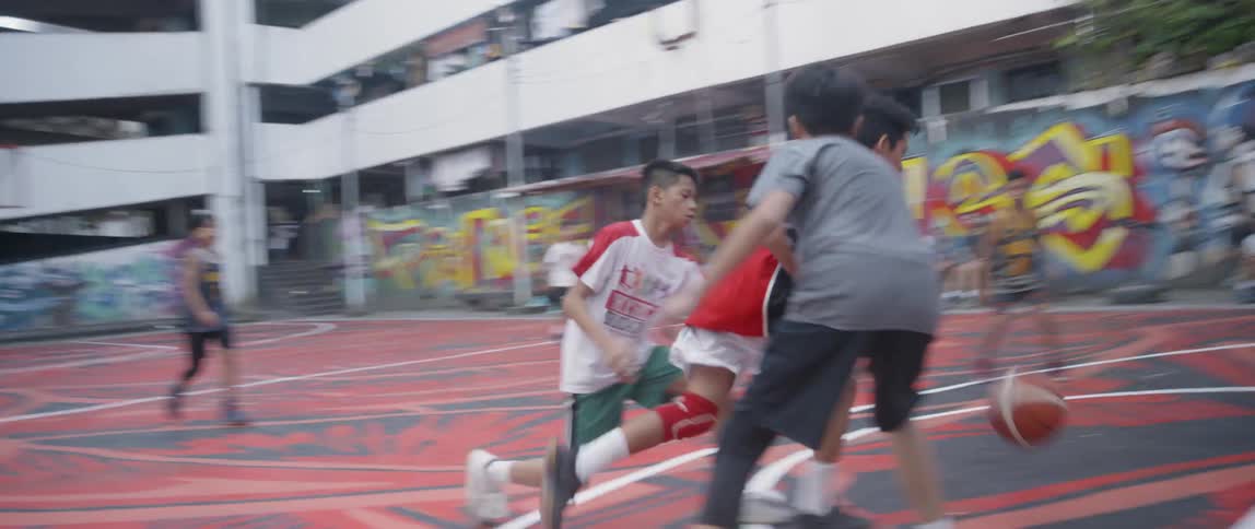 The two players face off on the basketball court