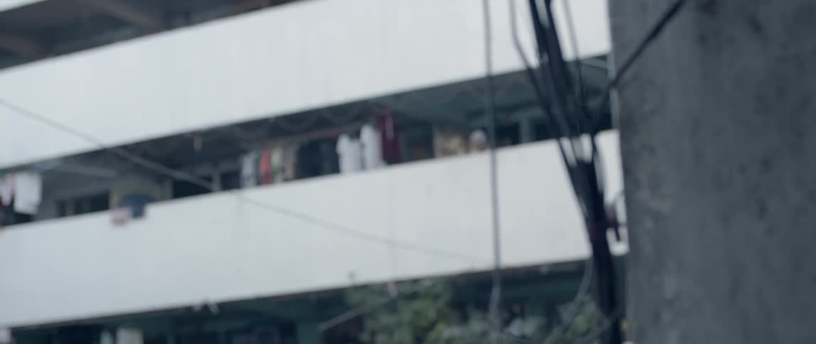 Clothes hang in a balcony