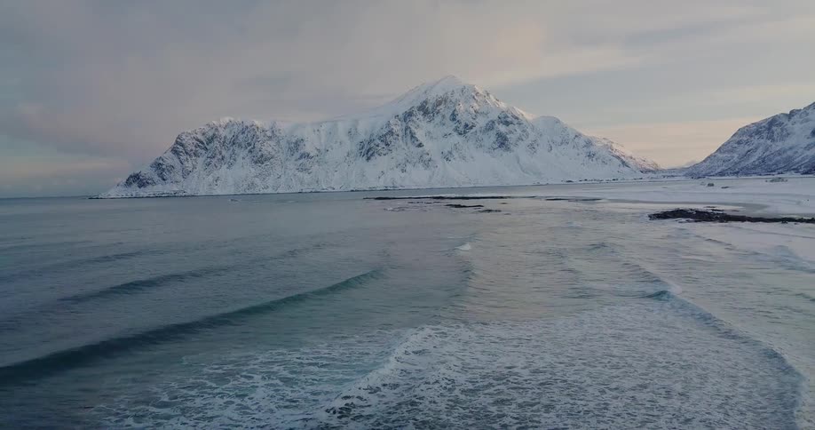 Water waves splashing in a cold climate