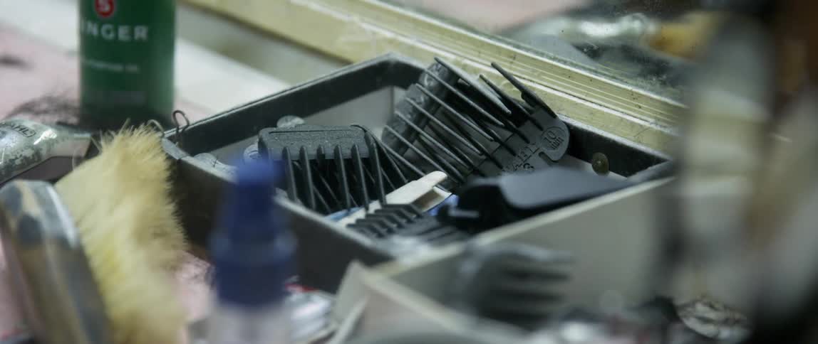 Hair trimmer attachments sit in a bin