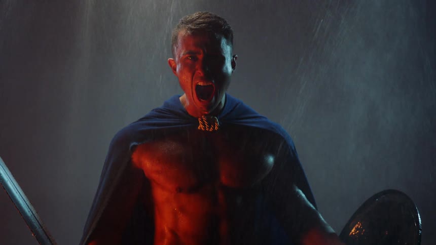 A gladiator screams in the rain