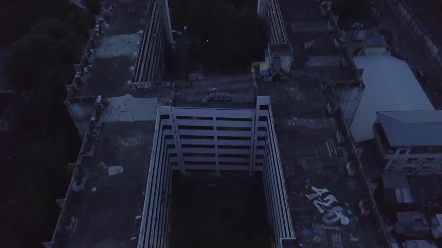 Outdoor basketball court sits in the middle of a building