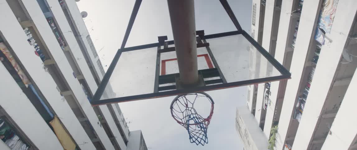 Net on a basketball hoop blows gently in the breeze