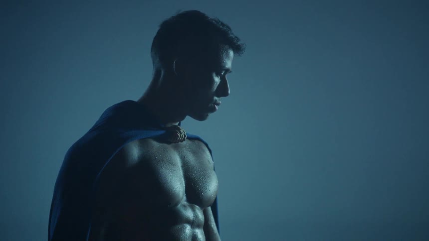 A gladiator stands and exhales