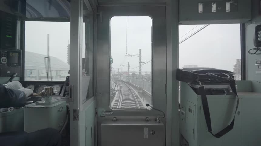 A conductor operates a train