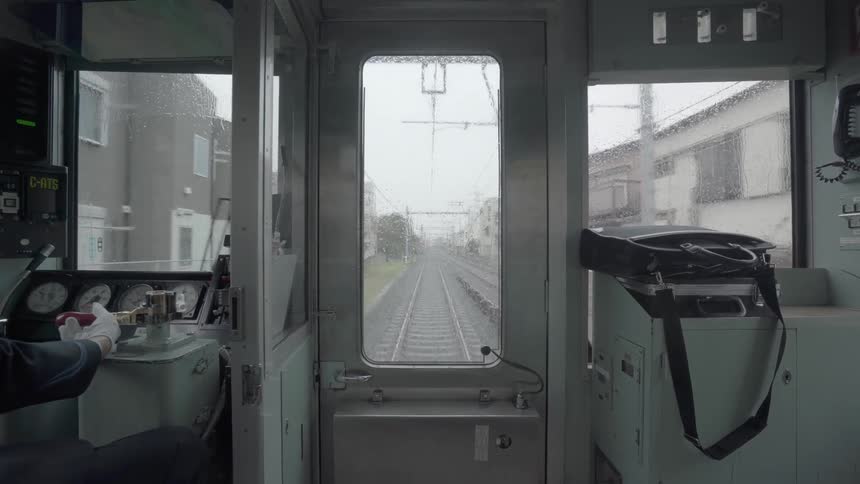 A conductor operates a train