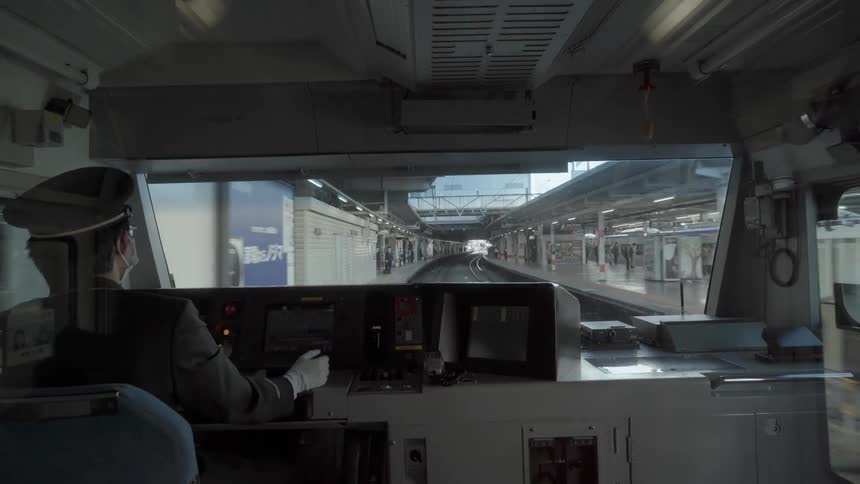 A conductor operates a train