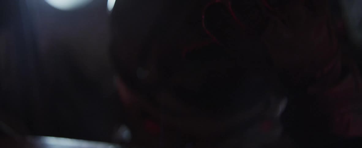 Close up of a man in uniform leaning forward