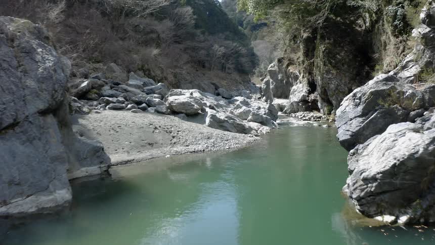 A river flows through rocks and boulders