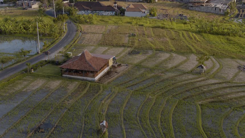 A building is surrounded by fields