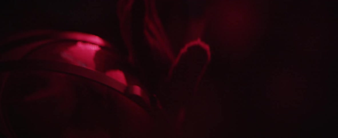 Person moving around in a dark area