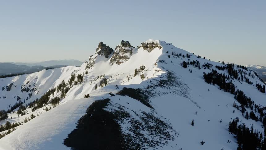 Snow covered ridges and peaks on a sunny day
