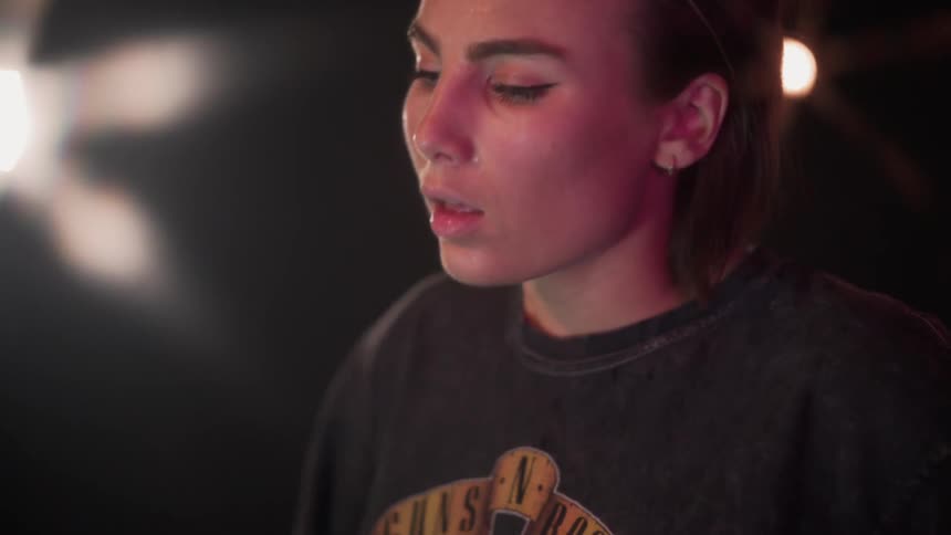 The woman is breathing heavy and sweating