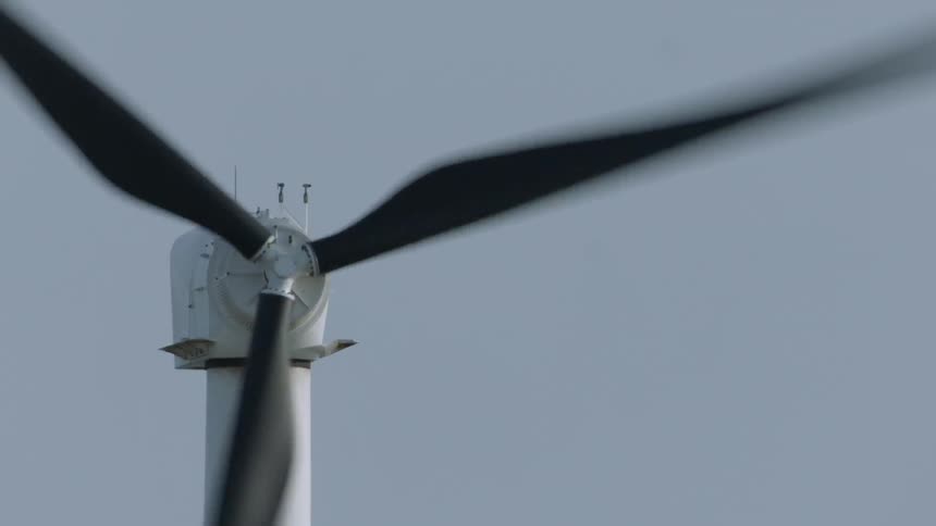 Blades spin on a wind turbine