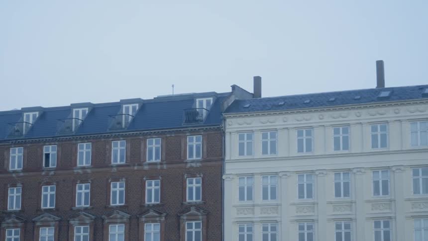 Buildings stand in a city