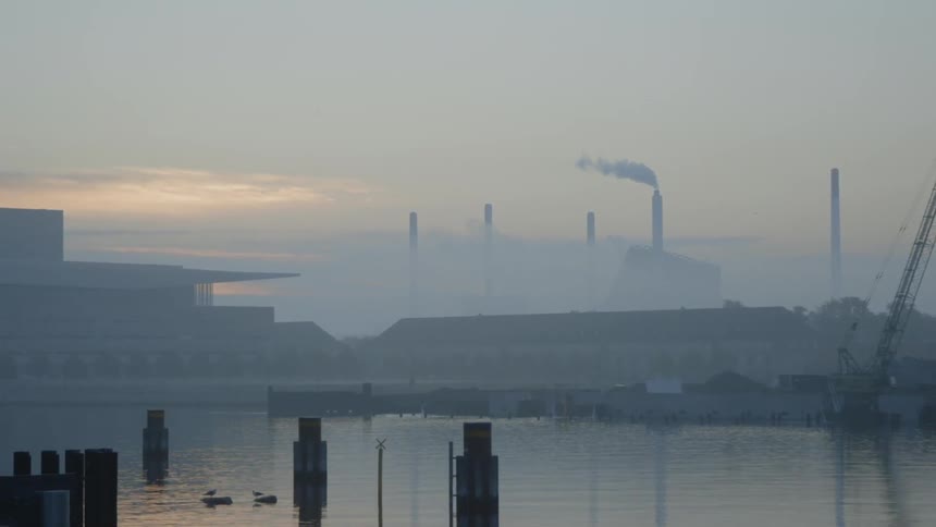 Smoke pours from silos