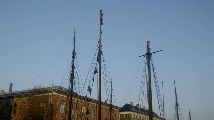 Boats float on a city canal