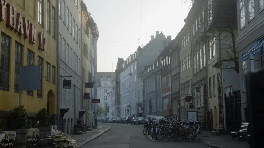 The city street is quiet on a cloudy day