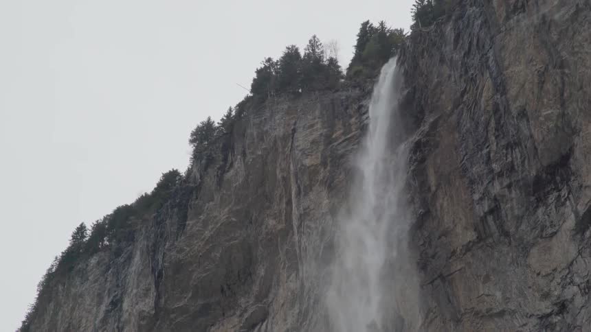 Water flows down a cliff