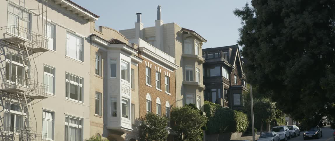 Row houses on a sloped city street