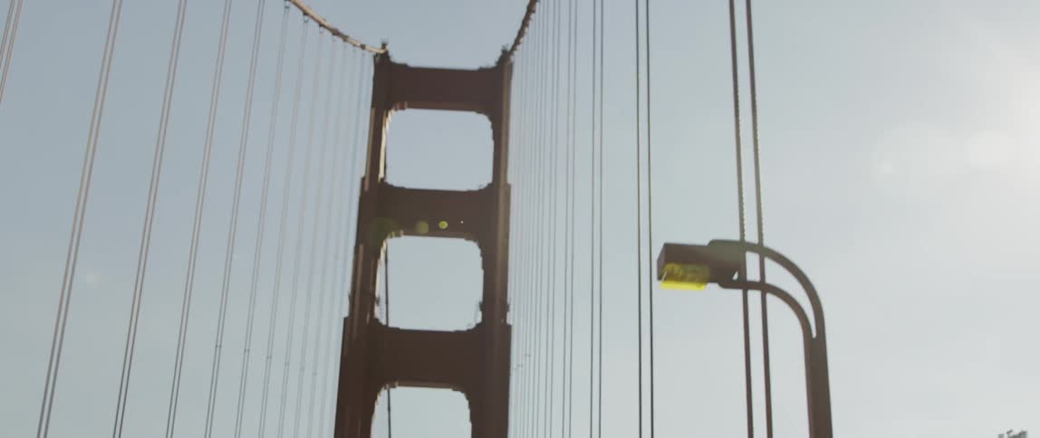The bridge has long wires going up
