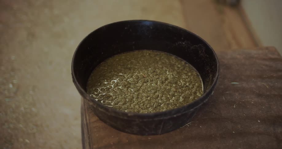 The bowl is full of food on the counter