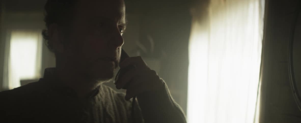 A man talking on the phone