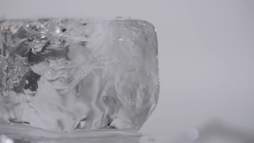 A fork chips at a chunk of ice