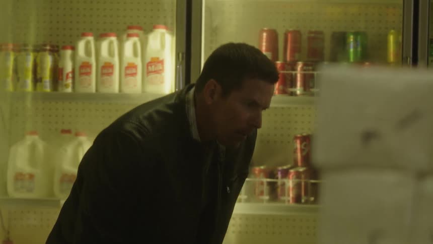 Man shops in a grocery store