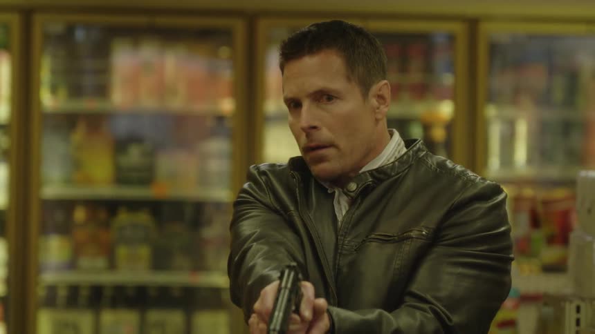 A man fires his gun in the grocery store