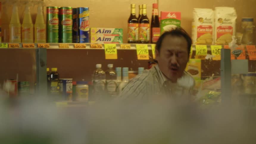 A man in the grocery store pulls out a gun and gets shot