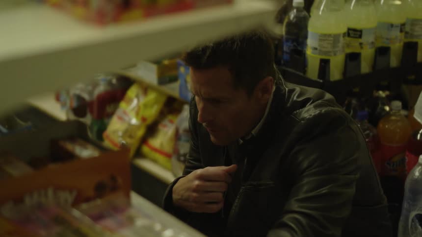 Man shops in a grocery store