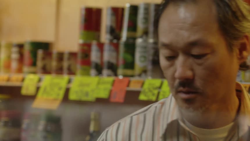 Man walks in a grocery store