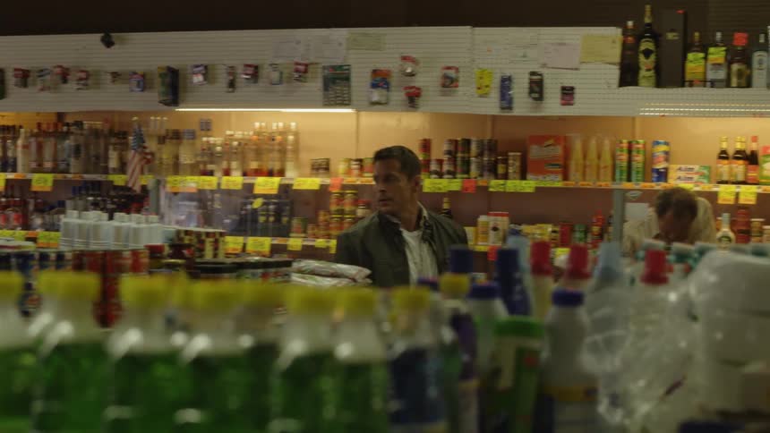 Man walks through a convenience store