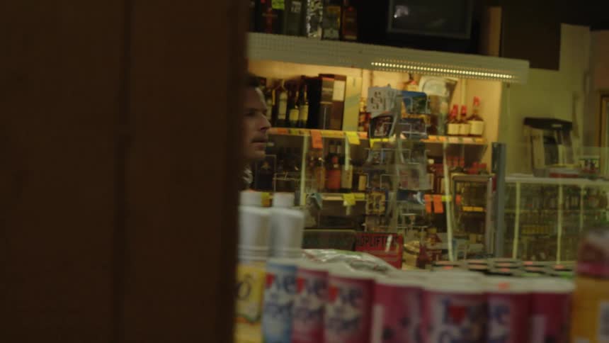 A man shops in a convenience store