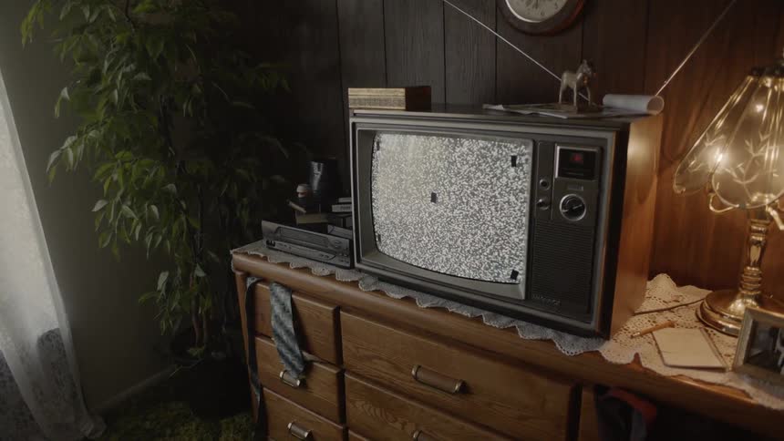 The small television is full of static