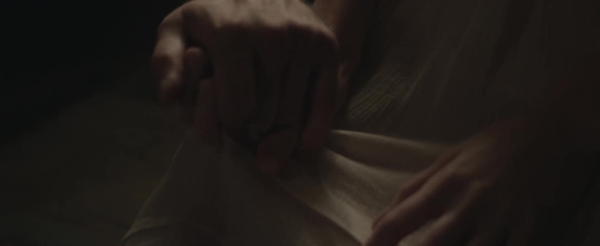 A man holding a woman's hand