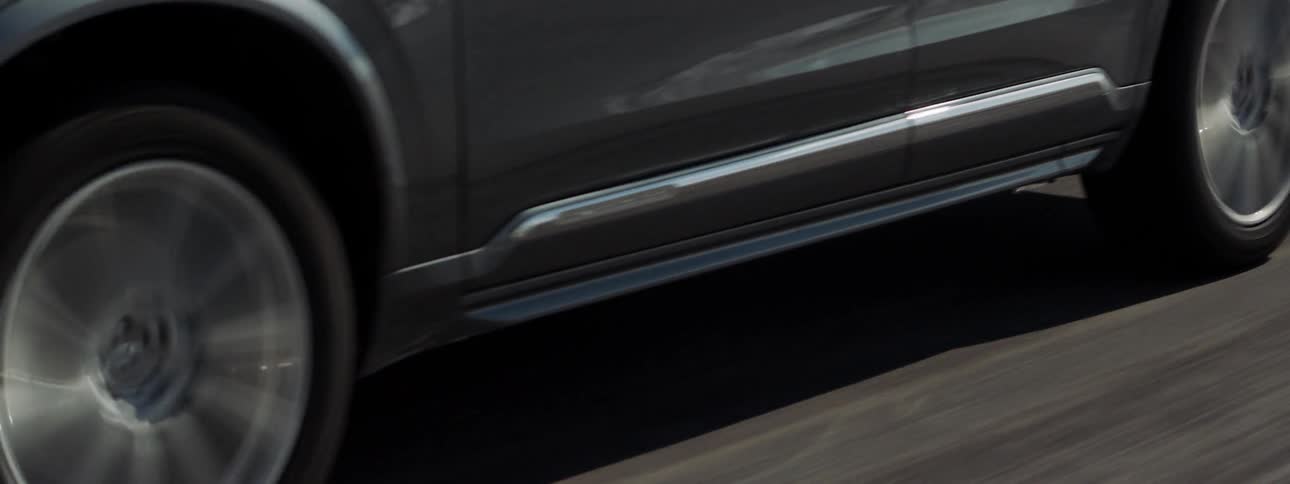 The car races down the road