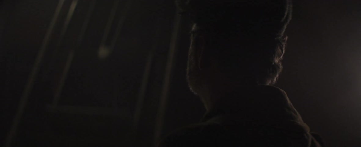 Dark area with a man looking up