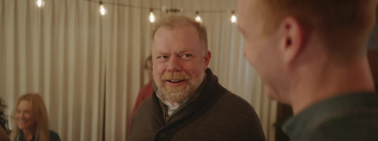 People have fun talking at a party