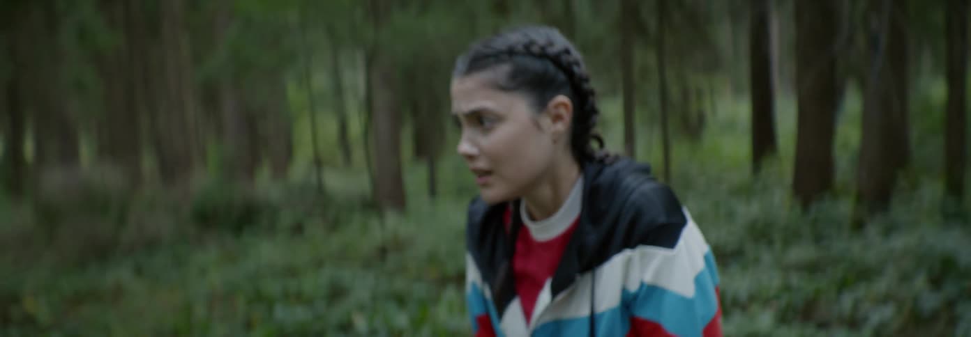 Woman panics in a forest