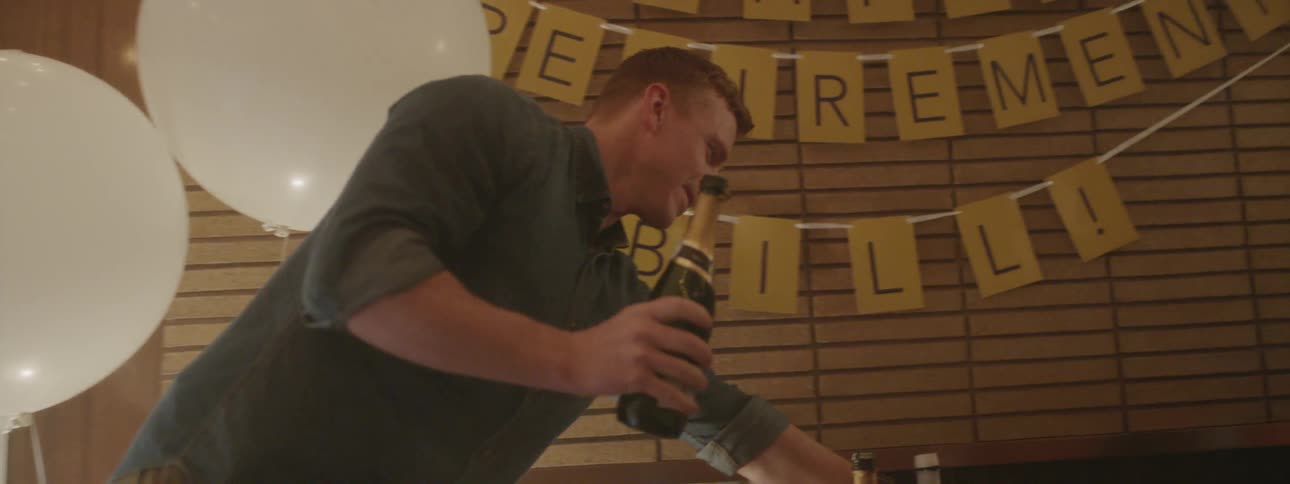 People poor drinks at a party